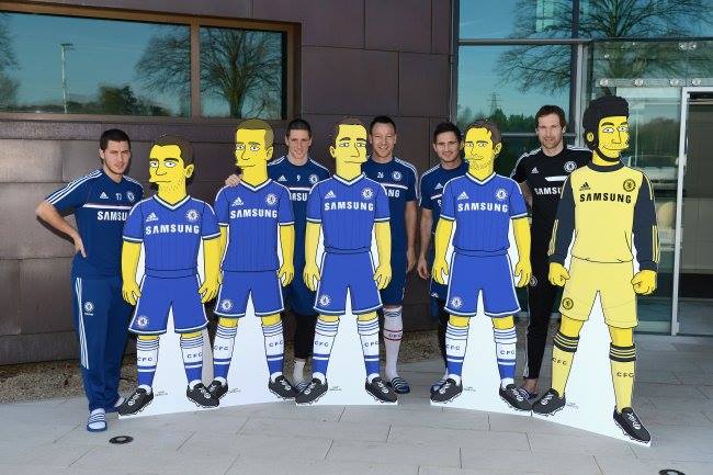 Jugadores del Chelsea posan con su caricatura