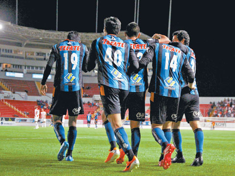 jugadores del Querétaro, en un juego del Clausura 2014.