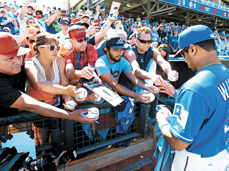 Fans de los Rangers, Rockies y Anaheim quería un autógrafo