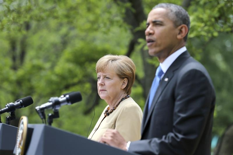 El presidente estadunidense Barack Obama y la canciller alemana Angela Merkel durante la rueda de prensa tras su encuentro celebrado en la Casa Blanca