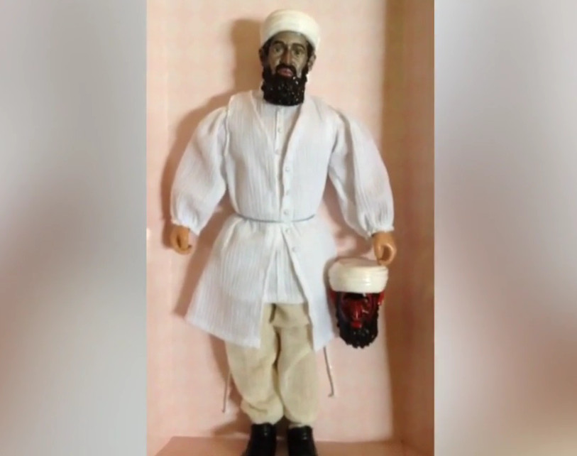 Según el "Post", el muñeco de Osama estaba pintado con un material que se disolvía con el calor, lo que dejaba al descubierto las facciones satánicas.