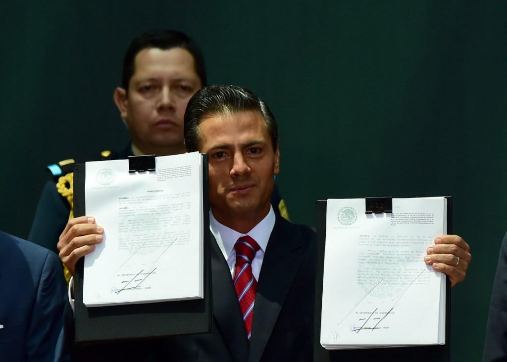 El presidente Enrique Peña Nieto tras promulgar las leyes secundarias en materia energética.