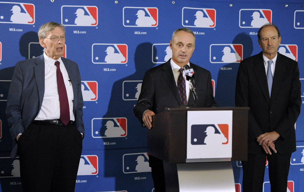 Bud Selig, Rob Manfred y Bill DeWitt Jr.