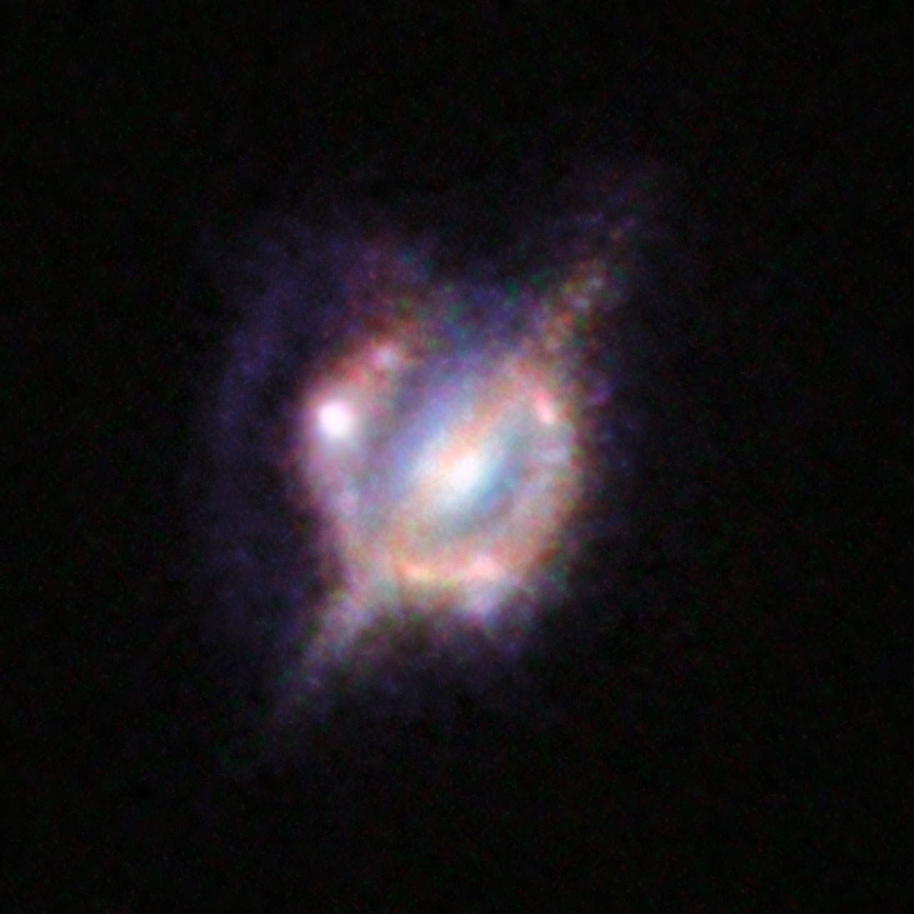 Las imágenes se obtuvieron gracias el efecto lupa que proporciona la gravedad de la galaxia H1429-0028.