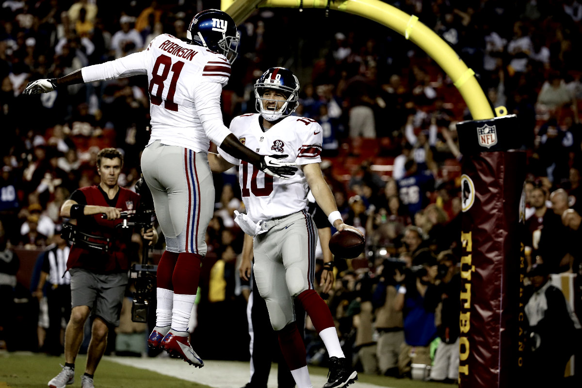 Eli pasó para 4 TD