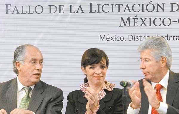 El titular de la ramo (derecha).