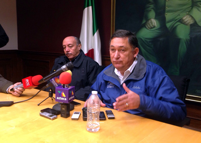 Alcalde Isidro López y director de la policía, Clemente Yáñez. 