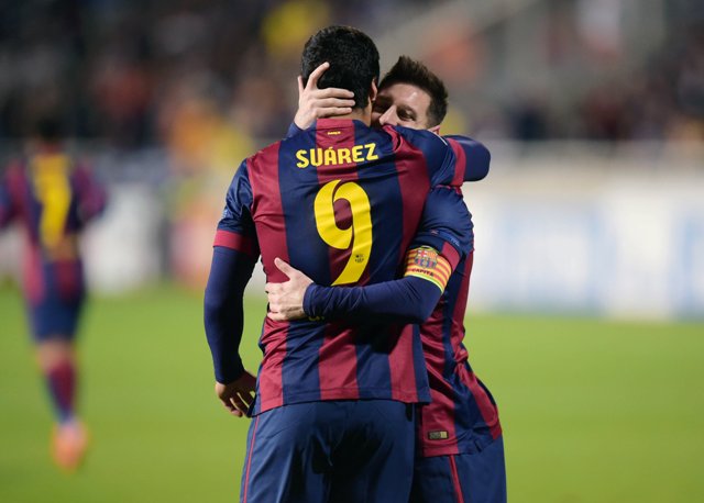 Lionel Messi y Luis Suárez festejan uno de los boles del Barça