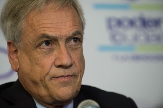 El ex presidente chhileno, Sebastián Piñera, durante la rueda de prensa de hoy en Caracas                                         
