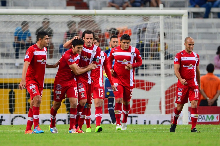 El equipo de Coras celebra una de sus anotaciones frente a Leones Negros