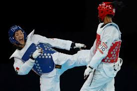 María Espinosa en combate 
