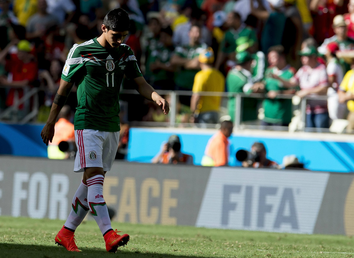 Alan Pulido, durante un partido de Brasil 2014