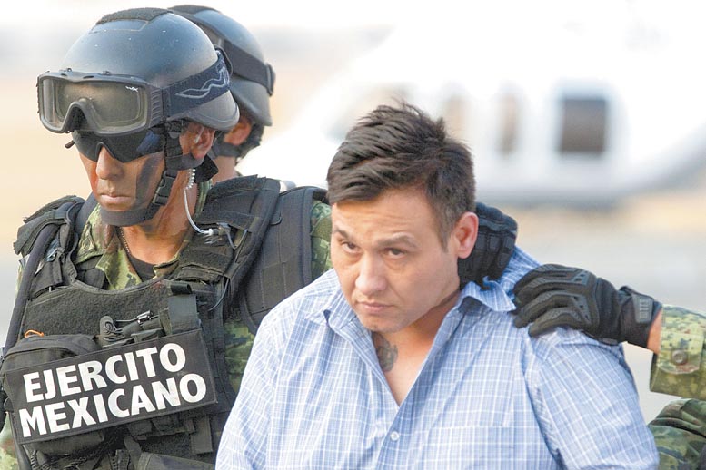 El líder absoluto de los zetas fue presentado públicamente en el hangar de la PGR del Aeropuerto Internacional de la Ciudad de México.