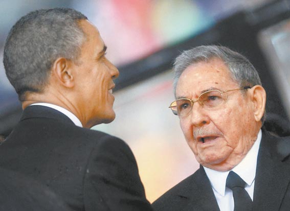 Ambos presidentes coincidieron en los funerales de Mandela, en 2013. 