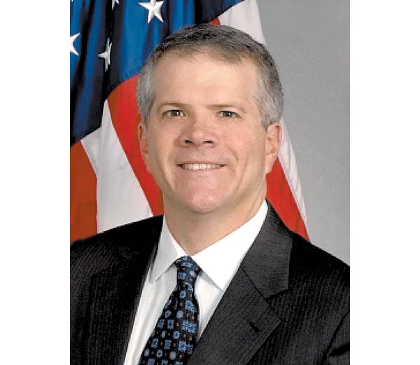 Bruce Andrews, líder de la delegación.