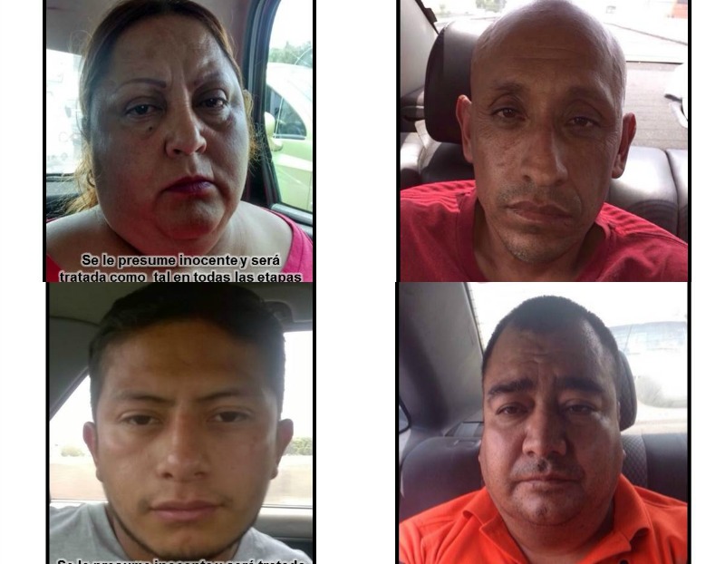 Los cuatro presuntos extorsionadores fueron detenidos cuando se repartían el dinero.