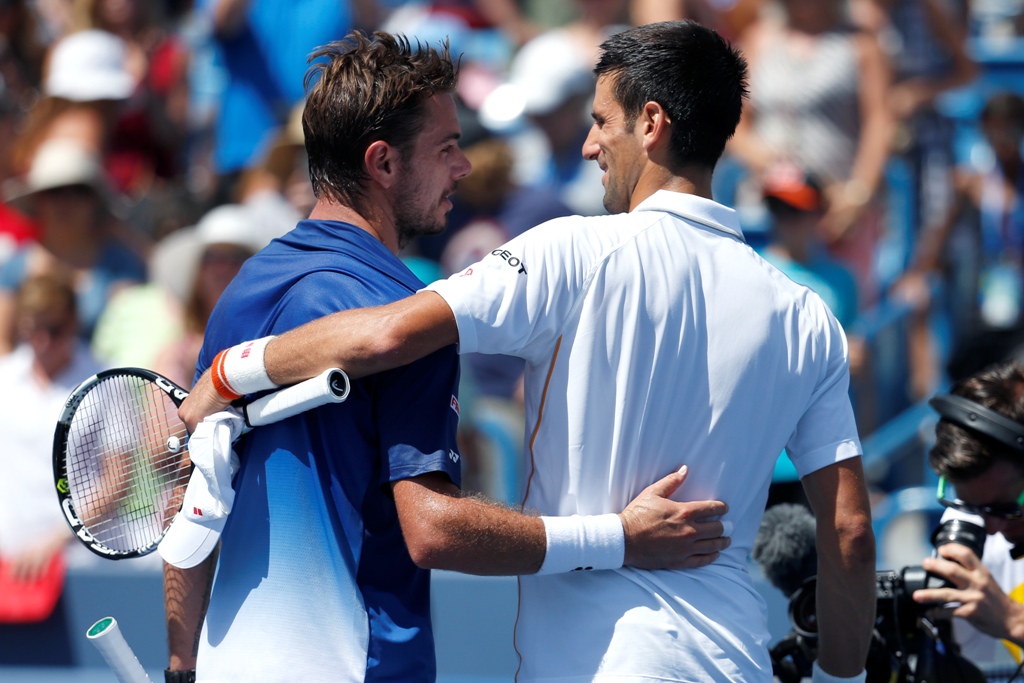 Djokovic y Wawrinka al término de su partido
