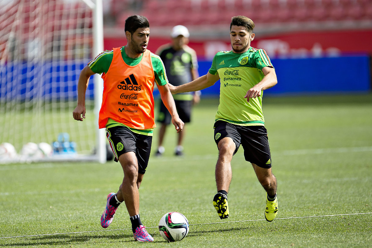 Vela y Martin en el entrenamiento del Tri 