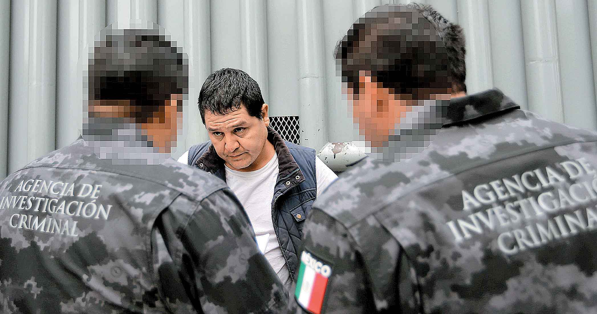 El ex jefe de sicarios, escoltado por elementos de la Agencia de Investigación Criminal.