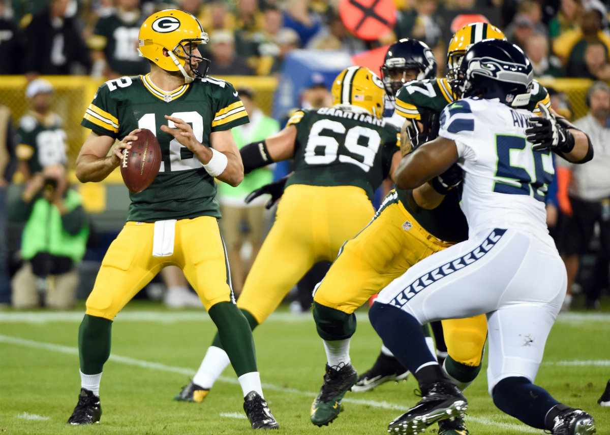 Rodgers lanzó para 2 touchdowns