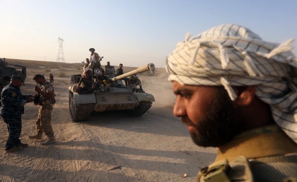 Milicianos chiítas que luchaban junto al ejército iraquí en la ofensiva contra el Estado Islámio se reagrupan en el Baiji, al norte de Tikrit