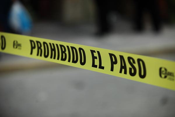 El occiso fue hallado en una casa.