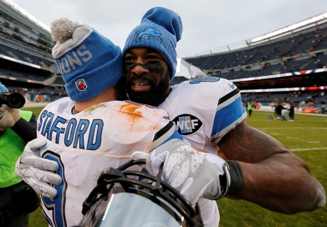 Matthew Stafford y Calvin Johnson festejan el triunfo sobre Chicago