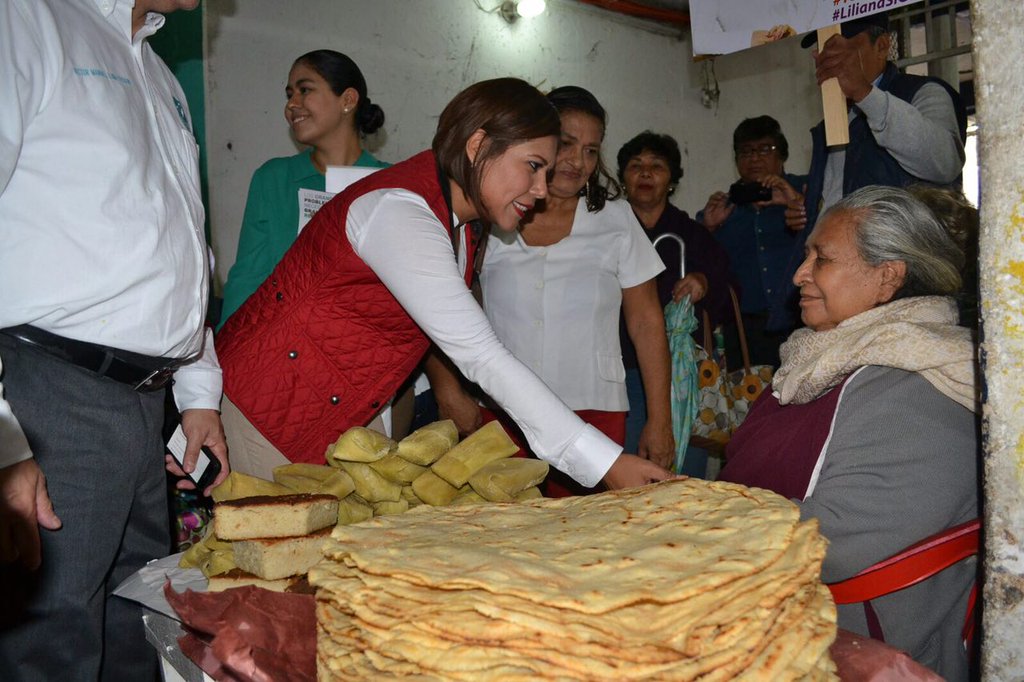 La candidata común del  PRI-PVEM-PANAL, Liliana Madrigal Méndez, arrancó en el mercado José María Pino Suarez,