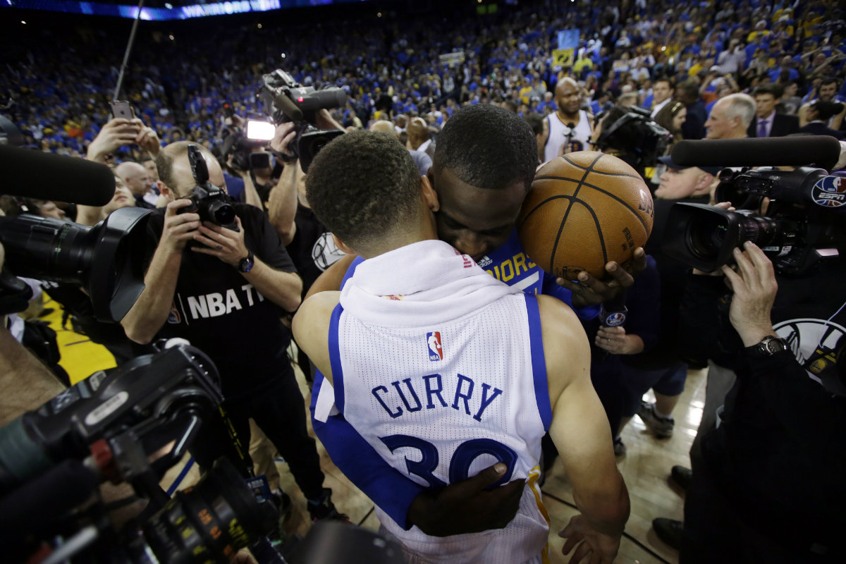 Stephen Curry y Draymond Green 
