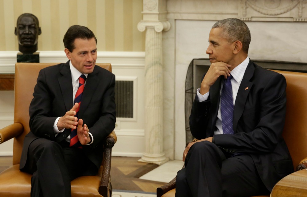 El presidente Enrique Peña Nieto (i) con su par estadunidense Barack Obama, en la Casa Blanca.