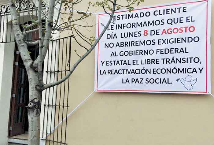 Aviso de los comerciantes con las exigencias a la autoridad.