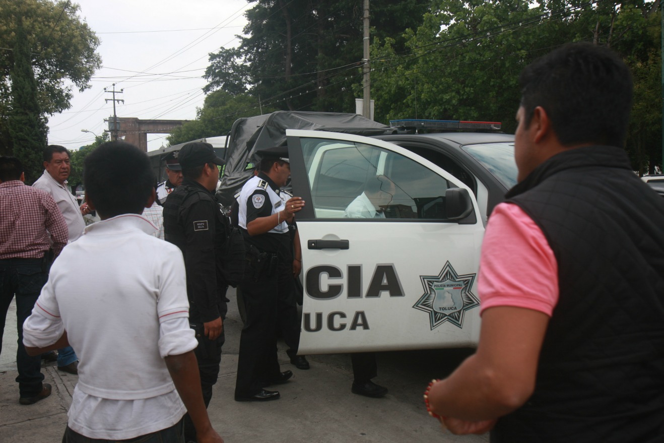 Extorsionador detenido en Toluca. Policía. Patrulla.