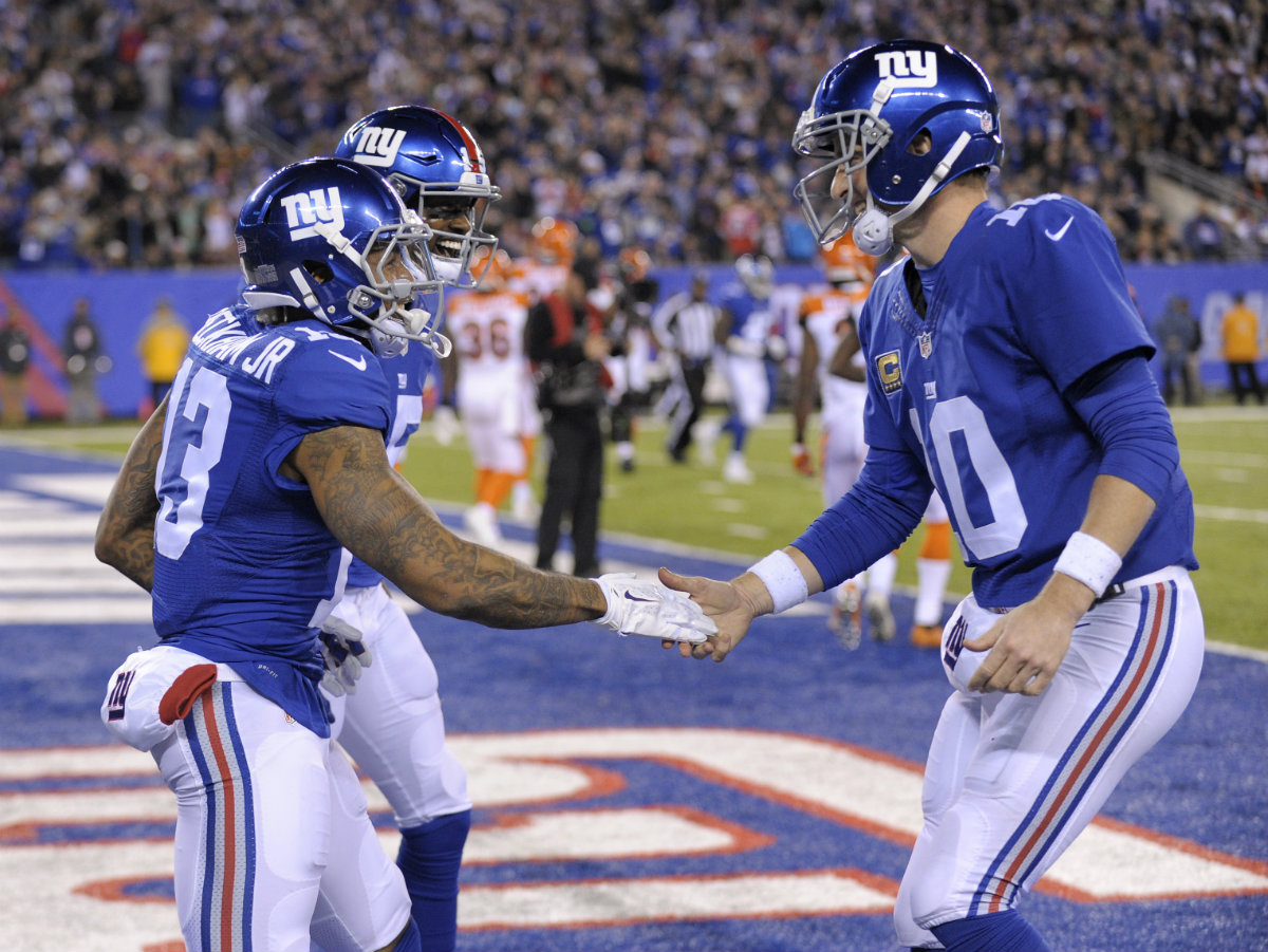Odell Beckham Jr. celebra con Eli Manning el triunfo
