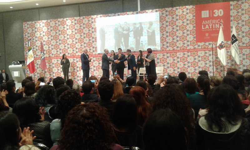 Entregan estafeta de invitado a Madrid