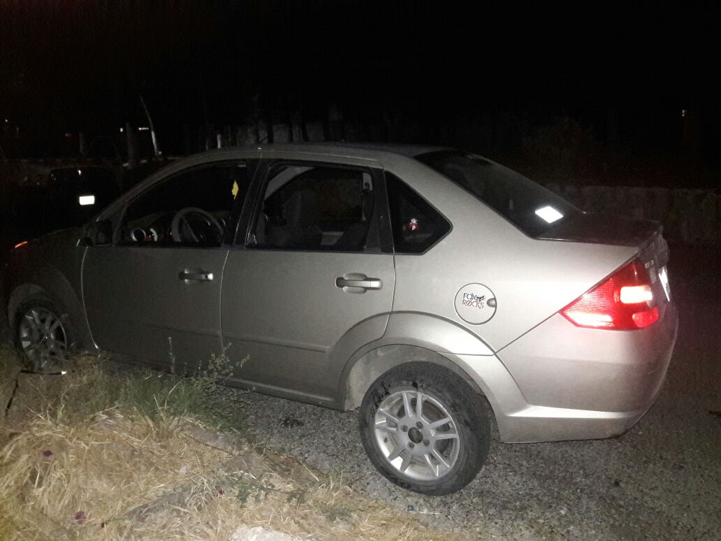 Automóvil que conducían elementos de la fiscalía señalados por el crimen