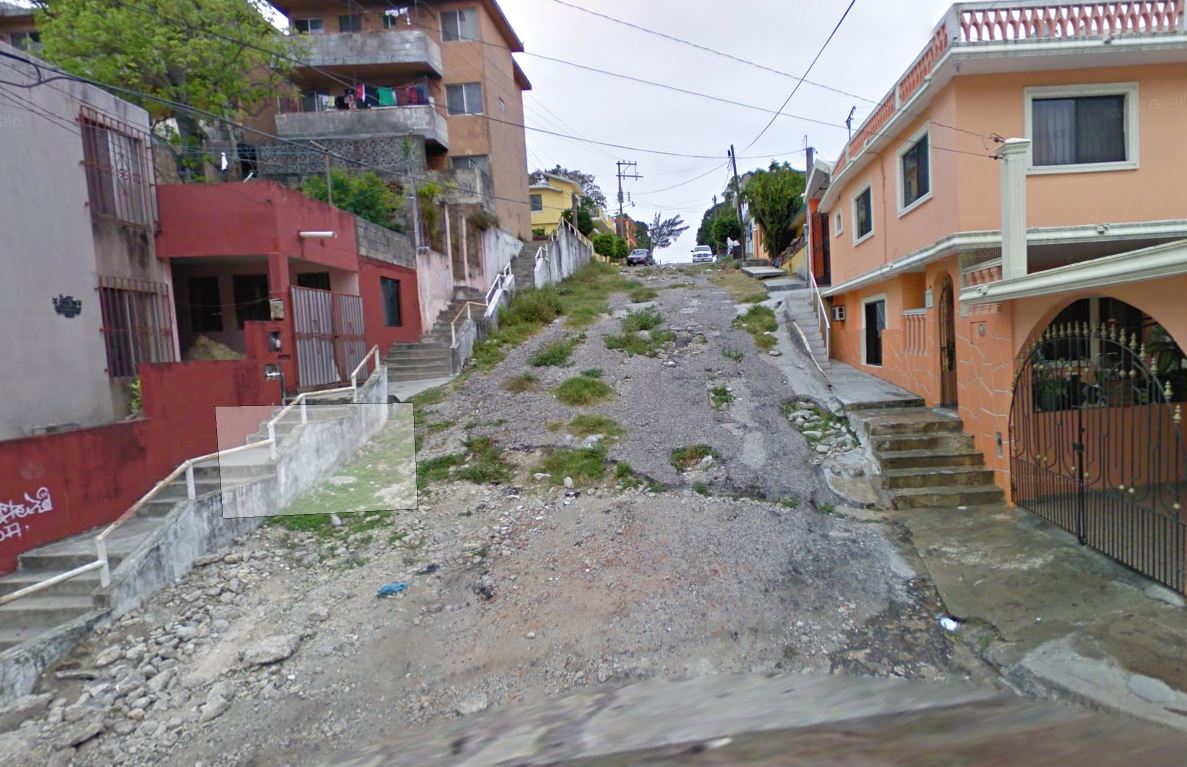 Calle sin pavimentar.