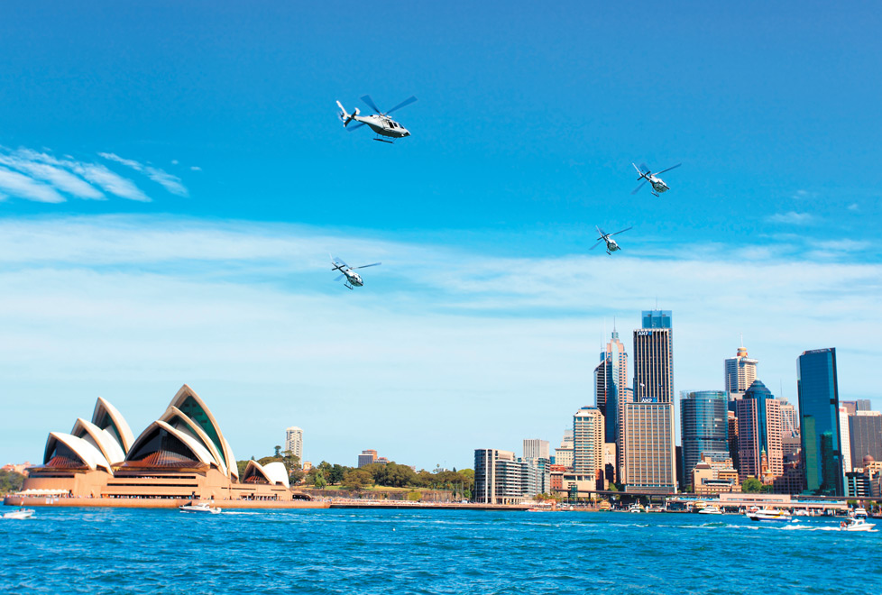 Sídney, Australia. Volando por encima de la famosa sala de ópera, el puente del puerto y Nueva Gales del Sur, los tours de helicóptero australianos in