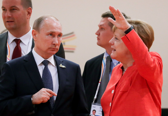 El presidente Putin y la canciller Merkel en la reunión del G20.