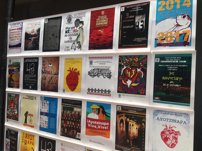 En la imagen aparecen algunos de las decenas de carteles que participaron en el concurso para representar la conmemoración los tres años del hecho.