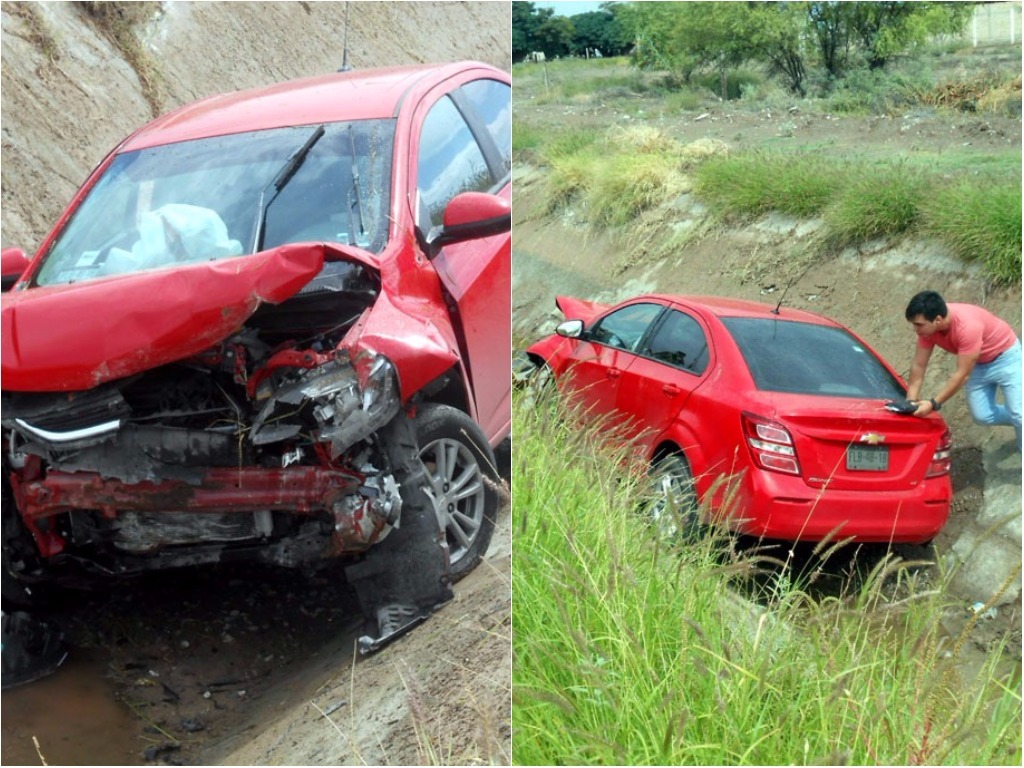 Debido a la velocidad el auto dio una vuelta y quedó atorado en el canal de riego. 