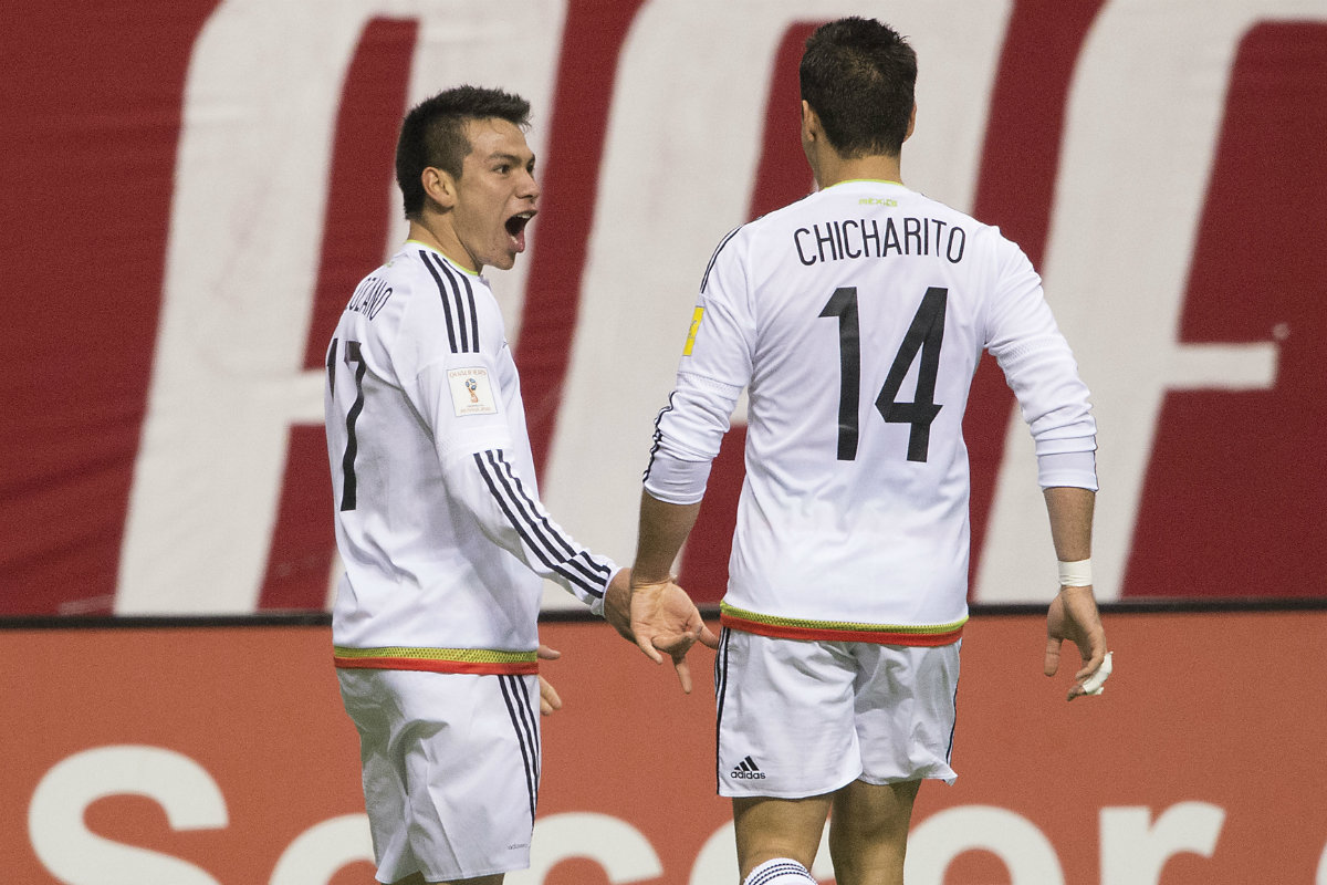 Hirving Lozano y Javier Hernández