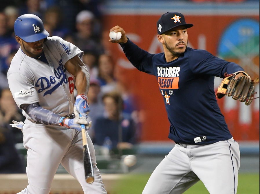 Yasiel Puig y Carlos Correa