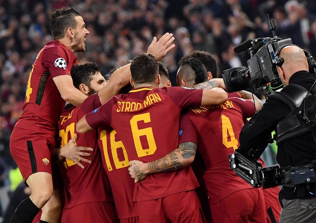 Jugadores de AS Roma en festejo de gol