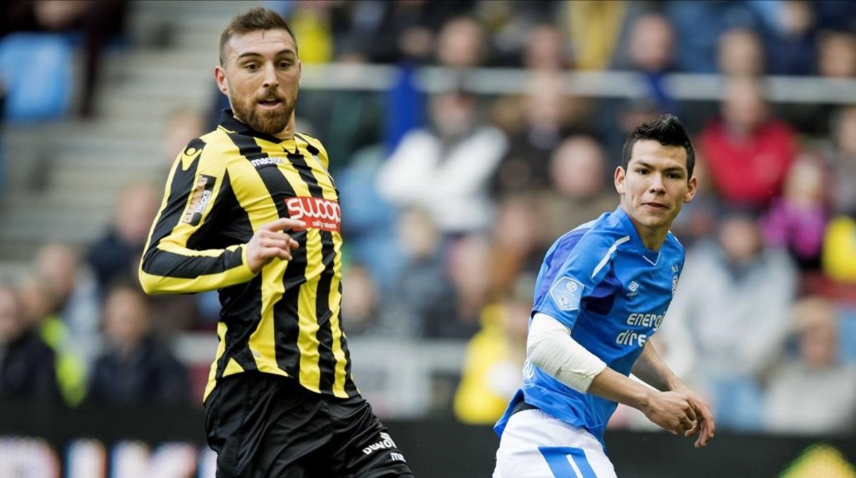 Guram Kashia en un partido contra Hirving Lozano 