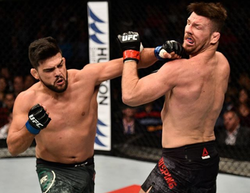 Kelvin Gastelum conectando a Michael Bisping.