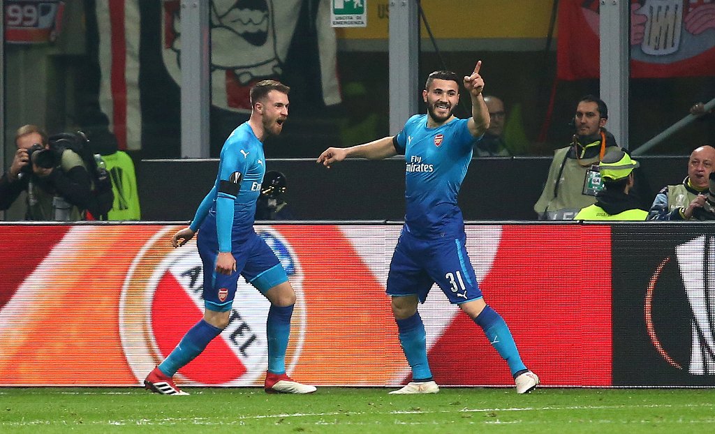 jugadores de Arsenal en festejo de gol 