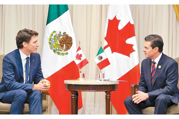 Reunión previa de Trudeau y Peña a la inauguración de la octava cumbre en Lima. 
