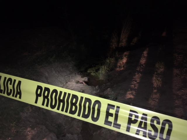 El cuerpo fue encontrado semi-enterrado.