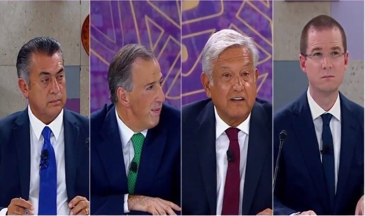 Los candidatos a al Presidencia durante el tercer debate. (Captura de pantalla)