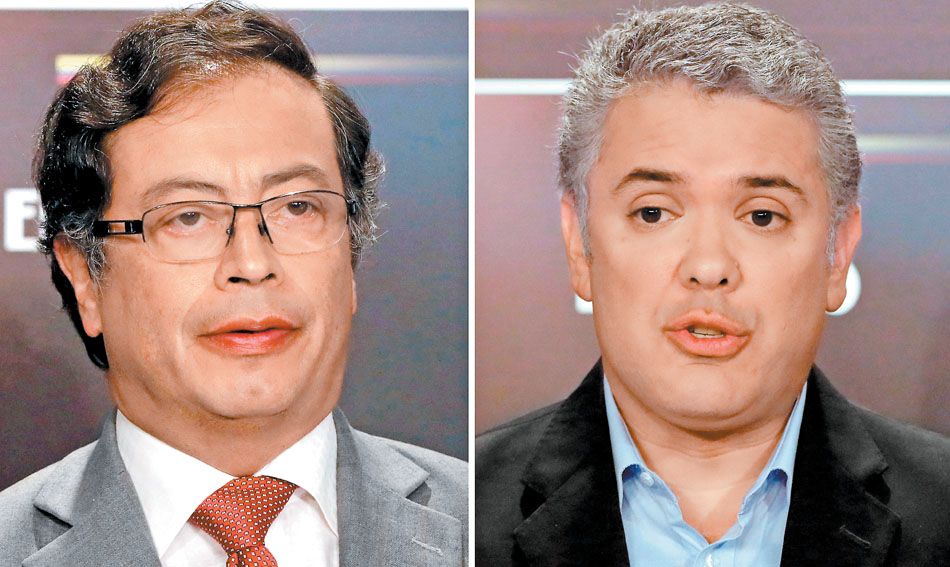El ex alcalde de Bogotá (izq.) apoya el acuerdo alcanzado con la guerrilla, mientras Duque ha sido más crítico con el pacto firmado por Santos. (Reute